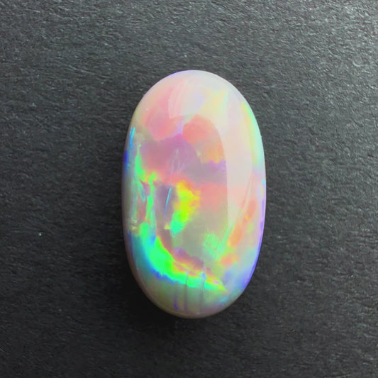 3.55cts Dark Opal With A Red Pink Multicolor Play Of Color, From Lightning Ridge Australia