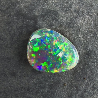 0.72cts Affordable Gem Dark Opal With A Beautiful Mixed Green Yellow Gold Pattern