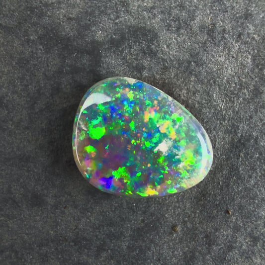 0.72cts Affordable Gem Dark Opal With A Beautiful Mixed Green Yellow Gold Pattern