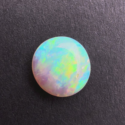 0.82cts Affordable Crystal Opal With A Blue Yellow Gold Play Of Color, From Lightning Ridge Australia