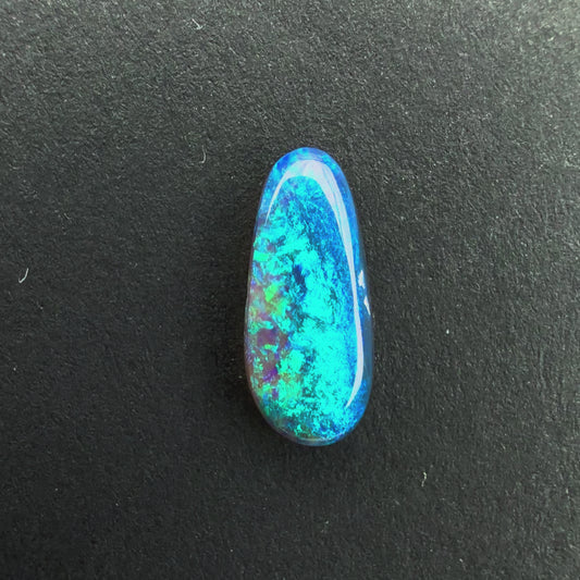 0.71cts Dark Opal With A Dark Blue Green Play Of Color, From Lightning Ridge Australia