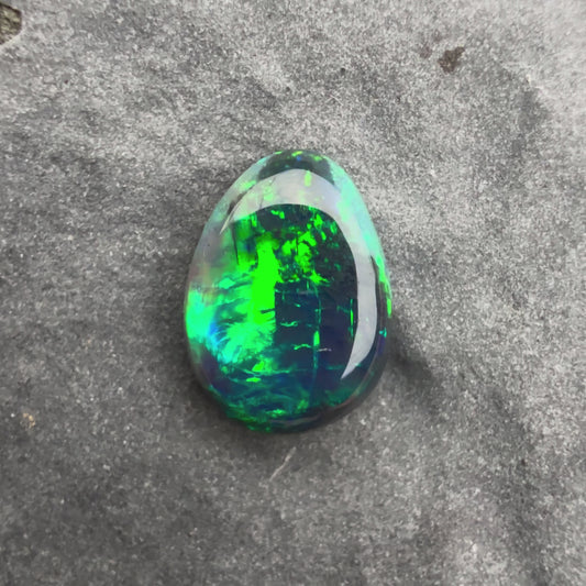 0.58cts Affordable Black Opal With A Blue Green Play Of Color, From Lightning Ridge Australia