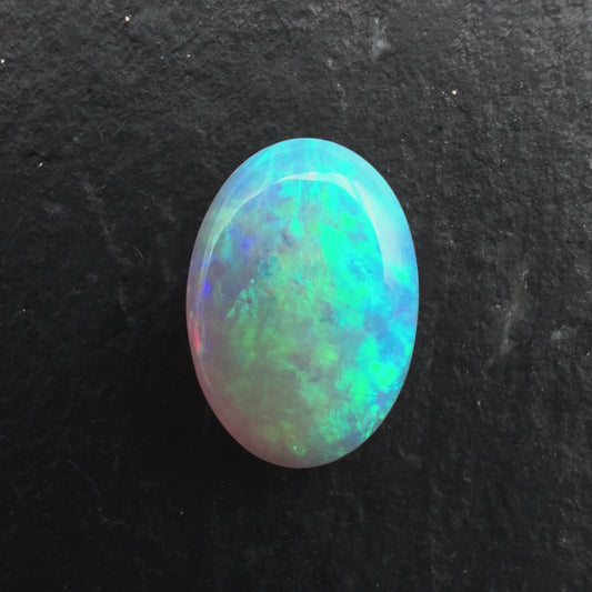 1.05Ct Affordable Crystal Opal With Light greens And Depth Of Color