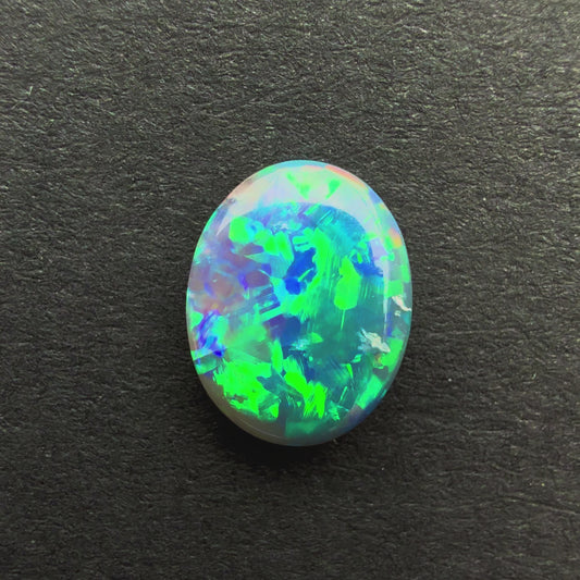 0.77cts Black Opal With A Green Blue Play Of Color, From Lightning Ridge Australia