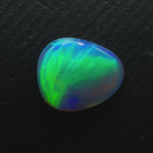 0.7ct Black Opal, This Stone Has An Vivid Green-Blue Rolling flash
