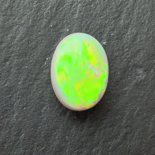 1.50ct Dark Opal With A Green, Yellow, Gold Play Of Color, From Lightning Ridge Australia