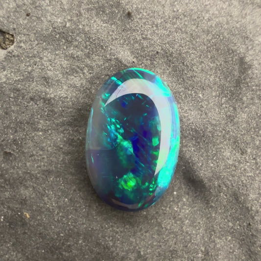 0.7cts Affordable Black Opal With A Blue Green Play Of Color, From Lightning Ridge Australia