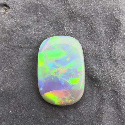 0.6cts Affordable Dark Opal With A Green Yellow Gold Play Of Color, From Lightning Ridge Australia