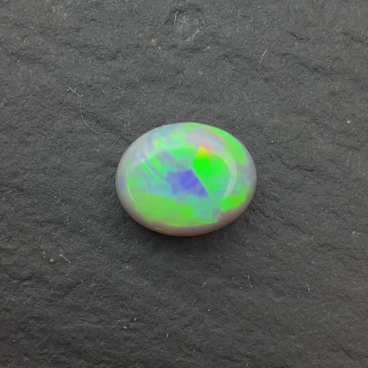 0.56ct Dark Opal With Green, Yellow, Gold Play Of Color, From Lightning Ridge Australia