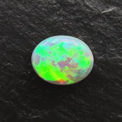 1.04ct Affordable Dark Opal With A Vivid Green Broadflash Pattern