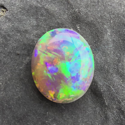 0.81cts Affordable Dark Opal With A Vivid Green Blue Play Of Color, From Lightning Ridge Australia
