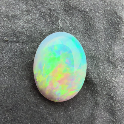 0.61cts Affordable Crystal Opal With A Blue Green Gold Play Of Color, From Lightning Ridge Australia