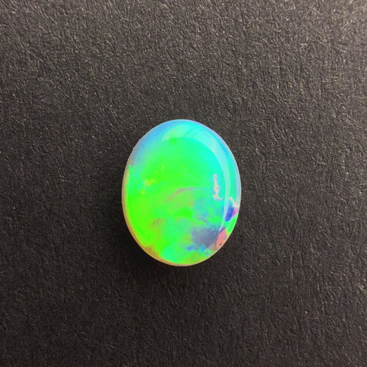 0.5cts Top Gem Crystal Opal With A Green Blue Play Of Color, From Lightning Ridge Australia