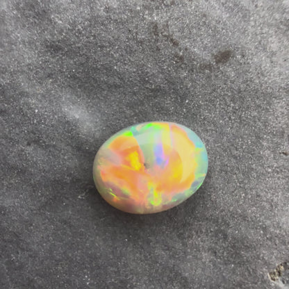 0.45cts Affordable Black Opal With A Red Multicolor Play Of Color, From Lightning Ridge Australia