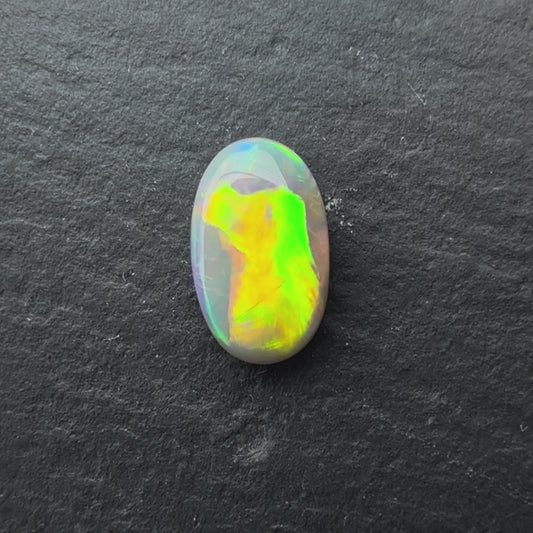 0.87ct DarkOpal With A Green, Yellow, Gold Play Of Color, From Lightning Ridge Australia