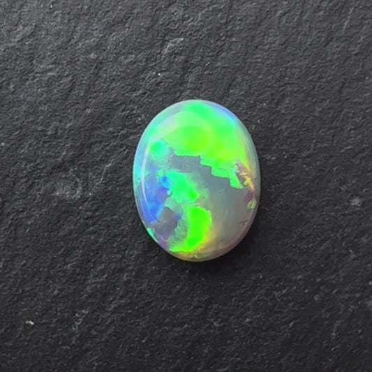 0.94ct Crystal Opal With A Green,Yellow, Gold Play Of Color, From Lightning Ridge Australia