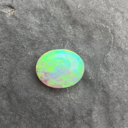 0.5cts Crystal Opal With A Green, Yellow, Gold Play Of Color, From Lightning Ridge Australia