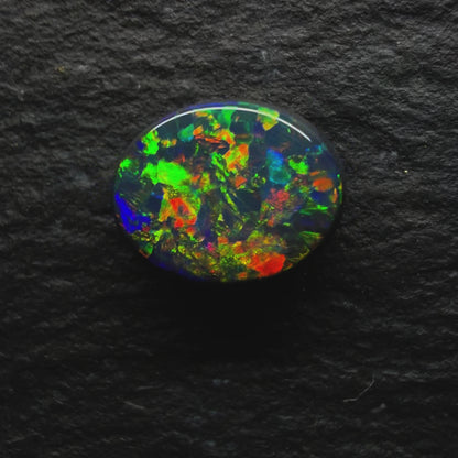 1.2ct Gem Black Opal, This Stone Has A Vivid Multi Color Palette With A Mixed Pattern