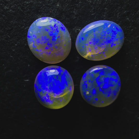Pair (Price For Parcel) Crystal Opals With Deep Violet color play 2.5cts Total