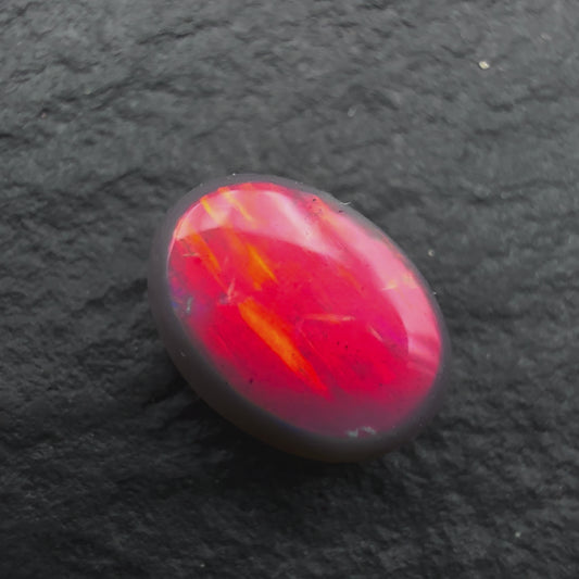 0.55ct Top Gem Black Opal With Ultra Rare Pigeons Blood Red color