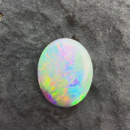 0.61cts Affordable Crystal Opal With A Green Yellow Gold Play Of Color, From Lightning Ridge Australia
