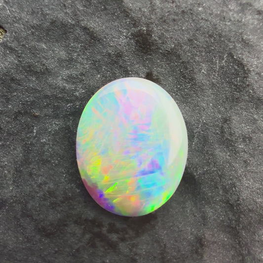 0.61cts Affordable Crystal Opal With A Green Yellow Gold Play Of Color, From Lightning Ridge Australia