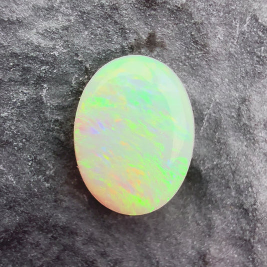 0.61cts Affordable Dark Opal With A Green Yellow Gold Play Of Color, From Lightning Ridge Australia
