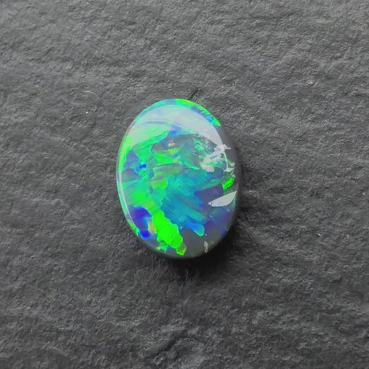 0.41ct Black Opal Opal With A Green, Blue Play Of Color, From Lightning Ridge Australia