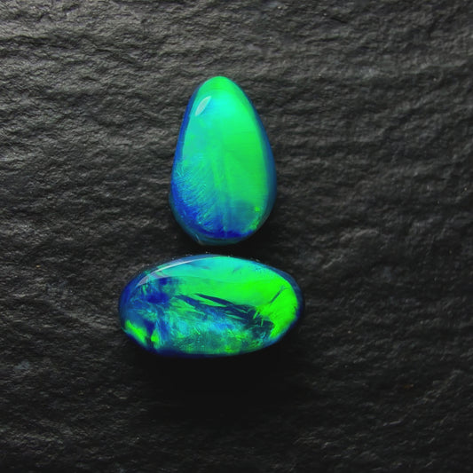 Mismatched Black Opal Pair With Brilliant Green Broadflash Pattern And Blue Undertones