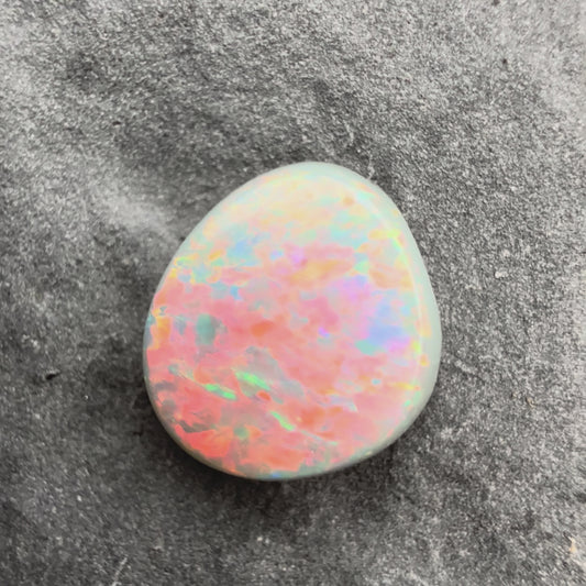0.66cts Affordable Dark Opal With A Red Pink Multicolor Play of color
