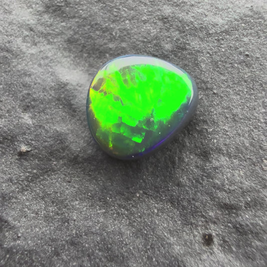 0.37cts Top Gem Micro Black Opal With A Green Yellow Gold Pattern