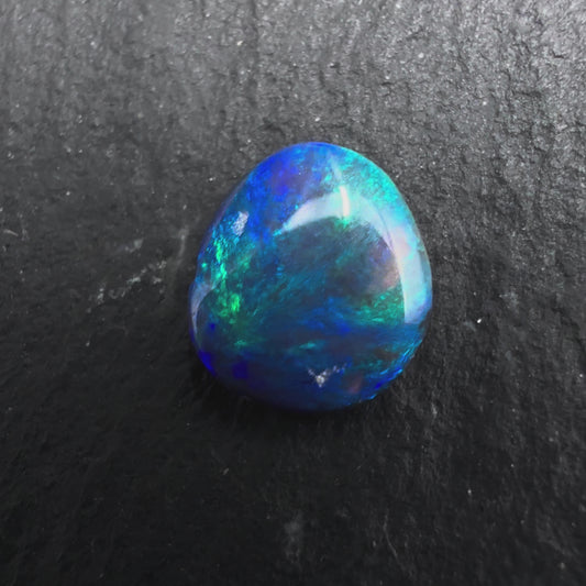 0.6ct Affordable Black Opal with Marbled Blues And Greens