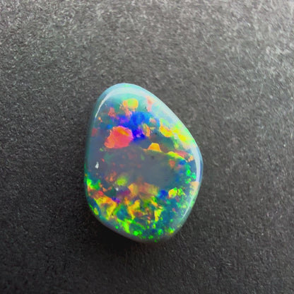 0.45cts Black Opal With A Red Pink Multicolor Play Of Color, From Lightning Ridge Australia