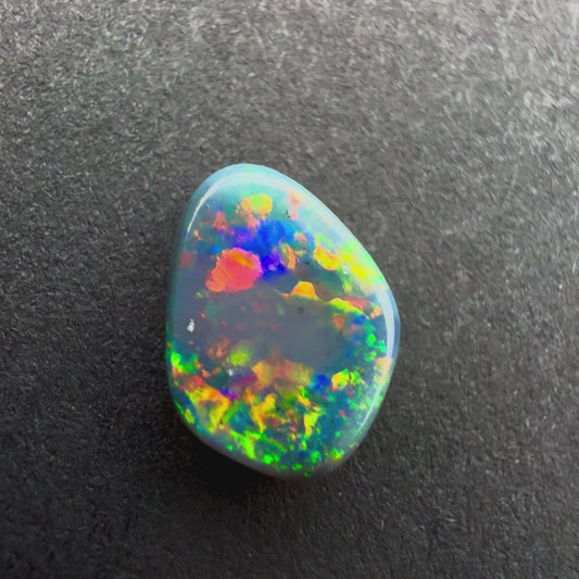 0.45cts Black Opal With A Red Pink Multicolor Play Of Color, From Lightning Ridge Australia