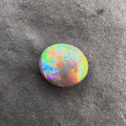 0.45cts Affordable Black Opal With A Red Multicolor Play Of Color, From Lightning Ridge Australia