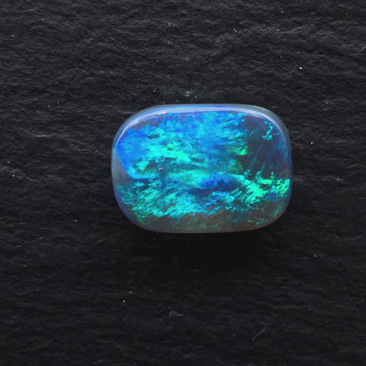 1.85 Gem Black Opal With Rich Blues-Greens And A Moss Pattern