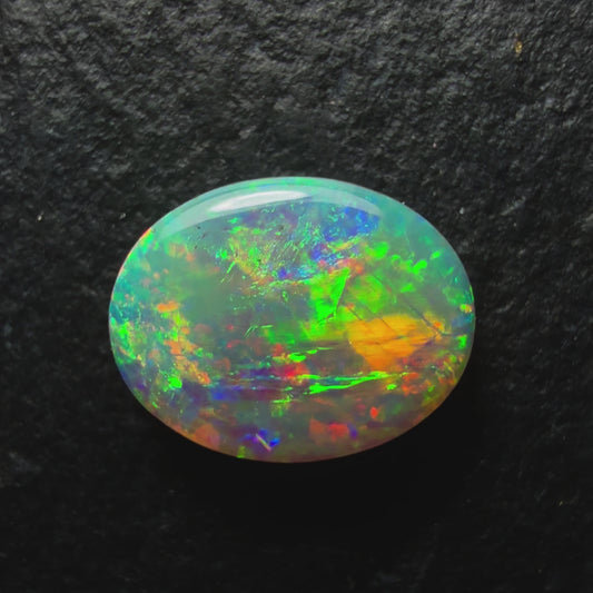 0.7ct Crystal Opal This Gem Has A Lovely mix Of Colors And Depth