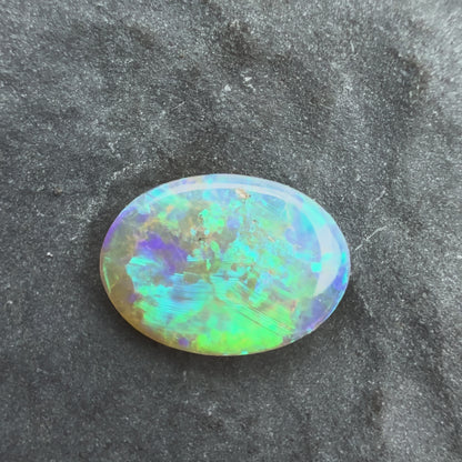 0.5cts Affordable Crystal Opal With A Vivid Green Blue Play Of Color, From Lightning Ridge Australia
