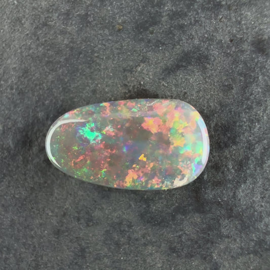 0.56cts Gem Crystal Opal With A Beautiful Mixed Red Pink Multicolor Pattern