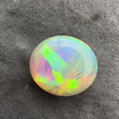 0.85cts Affordable Crystal Opal With A Green Yellow Gold Play Of Color, From Lightning Ridge Australia