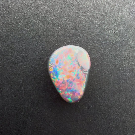 0.69cts Black Opal With A Red Pink Multicolor Play Of Color, From Lightning Ridge Australia