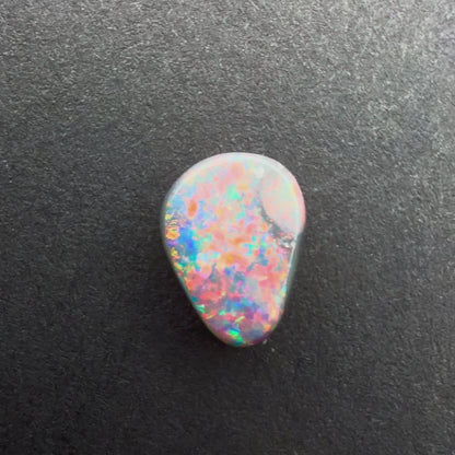 0.69cts Black Opal With A Red Pink Multicolor Play Of Color, From Lightning Ridge Australia