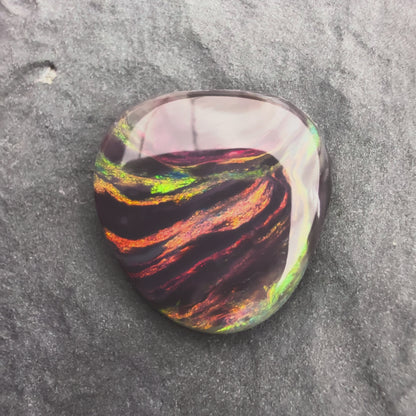 2.23cts Picture stone Black Opal With A Red Pink Multicolor Palette