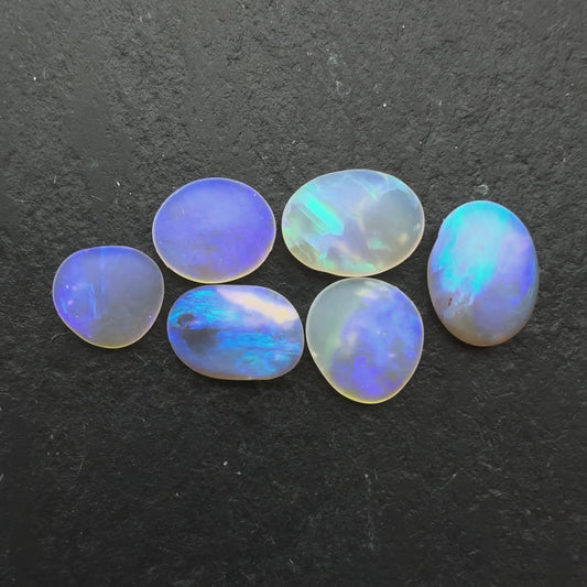 2.45ct Bundle (Price For Parcel) Matte finished opals with a soft purple glow