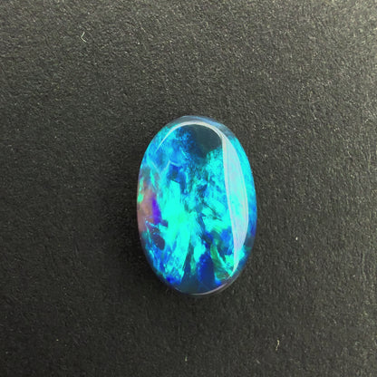 0.71cts Black Opal With A Dark Blue Green Play Of Color, From Lightning Ridge Australia