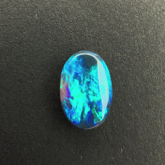 0.71cts Black Opal With A Dark Blue Green Play Of Color, From Lightning Ridge Australia