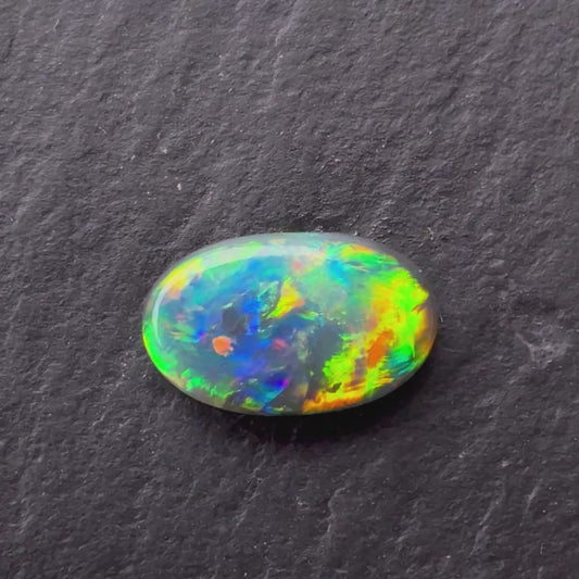 0.62ct Black Opal With A Green, Blue Play Of Color, From Lightning Ridge Australia