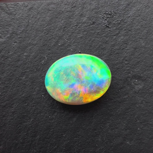 1.20cts Crystal Opal With A Green, Yellow, Gold Play Of Color, From Lightning Ridge Australia