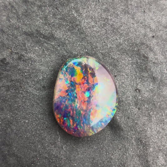 0.55cts Affordable Dark Opal With A Vivid Red Pink Multicolor Play Of Color