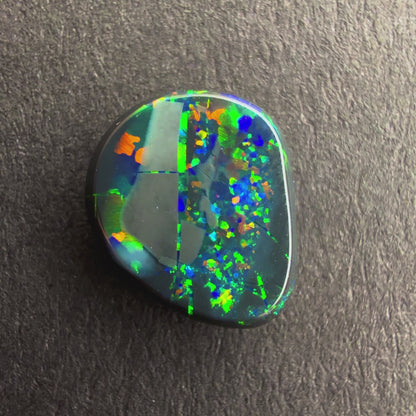 0.69cts Black Opal With A Red Pink Multicolor Play Of Color, From Lightning Ridge Australia (Copy)
